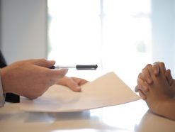 crop businessman giving contract to woman to sign 3760067