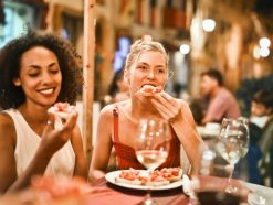 woman eating bruschetta 1537635